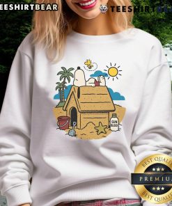Alt Text: Cute Snoopy and Woodstock graphic on a beach-themed sweatshirt, perfect for summer vibes and casual wear.