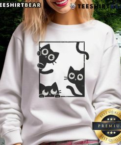 Adorable cute felines in frame sweatshirt showcasing playful cat designs perfect for cat lovers and cozy fashion.