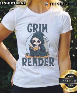 Alt Text: Cute Grim Reader wearing a ladies tee, engrossed in reading a book, showcasing a whimsical literary vibe.