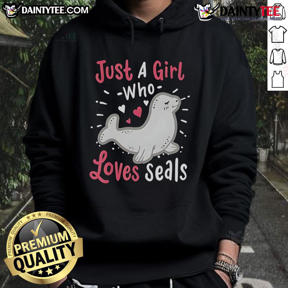 Cute Just A Girl Who Loves Seals Hoodie Cute girl wearing a 'Just A Girl Who Loves Seals' hoodie, smiling with a seal plush toy, showcasing her love for seals.