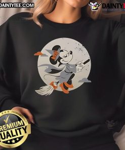 Cute Minnie Mouse in a witch Halloween sweatshirt, perfect for festive celebrations and Disney fans.