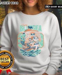 Cute Monkey D. Luffy from One Piece wearing a blue sea cruise sweatshirt, perfect for anime fans.