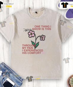 Alt Text: Comfort washed t-shirt with a cute design, showcasing the phrase about finding comfort through pain.