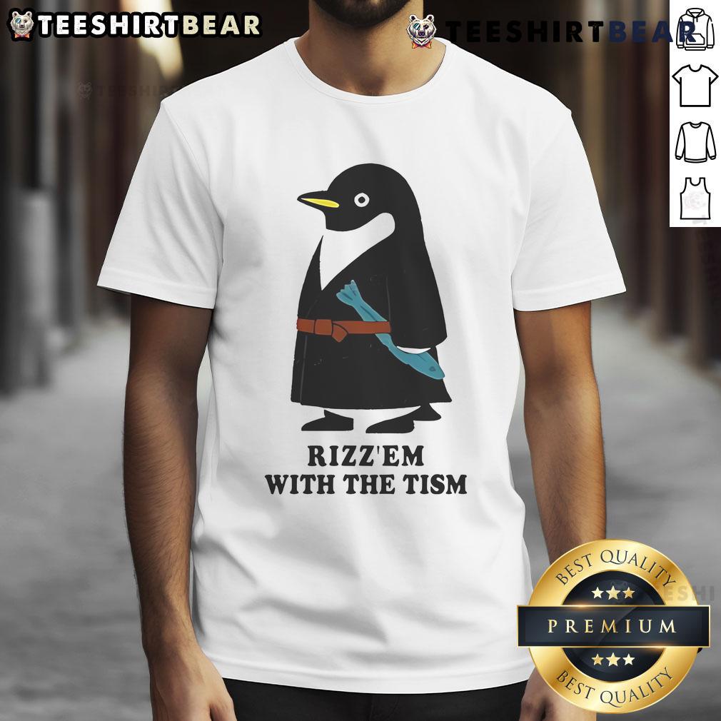 Cute Penguin Rizz'Em With The Tism T Shirt Cute penguin wearing 'Rizz'Em With The Tism T-Shirt' showcasing a playful design for penguin lovers.