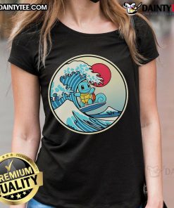 Cute Pokmon Squirtle surfing a wave on a ladies tee, perfect for fans of whimsical and fun Pokmon apparel.