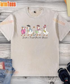Alt Text: Cute silly goose wearing a Just a First Grade Goose washed t-shirt, perfect for kids' fashion and animal lovers.