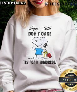 Cute Snoopy Nope Still Dont Care Try Again Tomorrow Sweatshirt featuring Snoopy's playful design and relaxed fit.