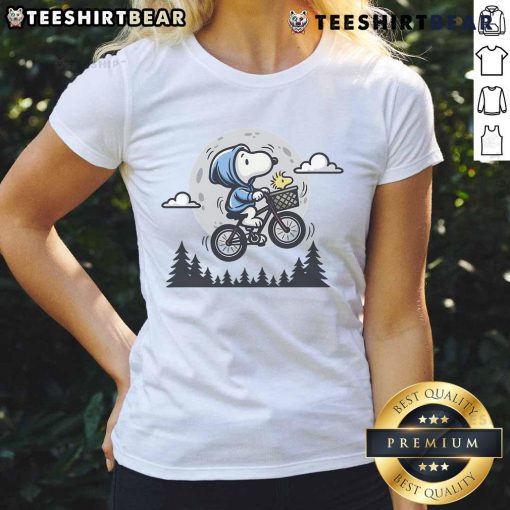 Alt Text: Cute Snoopy and Woodstock fly to the moon on a ladies tee, perfect for Peanuts fans and casual wear.