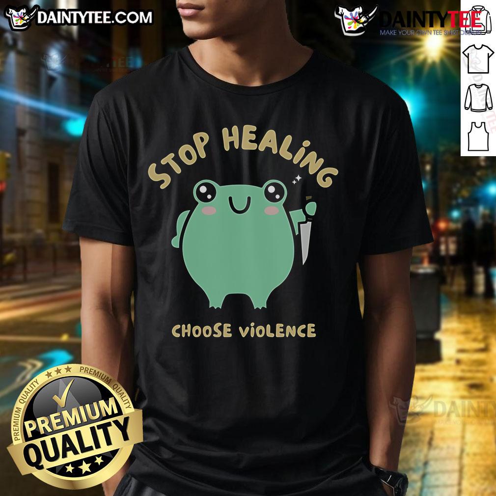 Cute Stop Healing Choose Violence Frog T Shirt Alt Text: Cute Stop Healing Choose Violence Frog T-Shirt featuring a playful frog graphic with vibrant colors and a fun slogan.