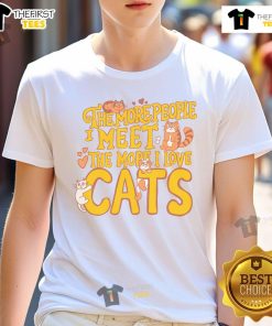 Alt Text: Cute t-shirt featuring the phrase The More People I Meet, The More I Love Cats for cat lovers and enthusiasts.