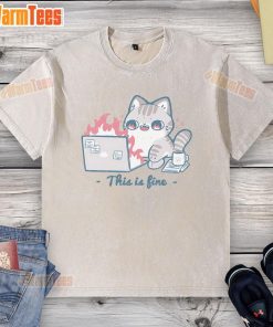 Alt Text: Cute cat in a 'This Is Fine' graphic tee working on a laptop, showcasing humor and pet fashion.