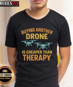 Funny T-shirt design: 'Buying Another Drone Is Cheaper Than Therapy' - perfect for drone enthusiasts and humor lovers.