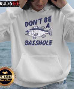 Funny 'Don't Be A Basshole' fishing bass fish joke hoodie worn by a person, perfect for fishing enthusiasts and humor lovers.