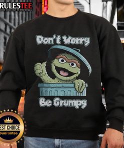 Funny 'Don't Worry Be Grumpy' sweatshirt design featuring playful typography on a cozy fabric background.