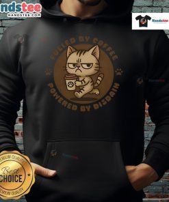 Cute cat hoodie with a funny Fueled by Coffee design, perfect for cat lovers and coffee enthusiasts.