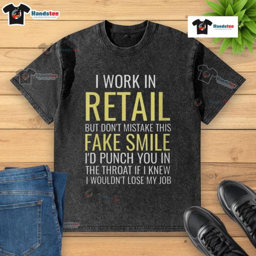 Funny I Work In Retail t-shirt featuring a sarcastic message about fake smiles and frustration in customer service.