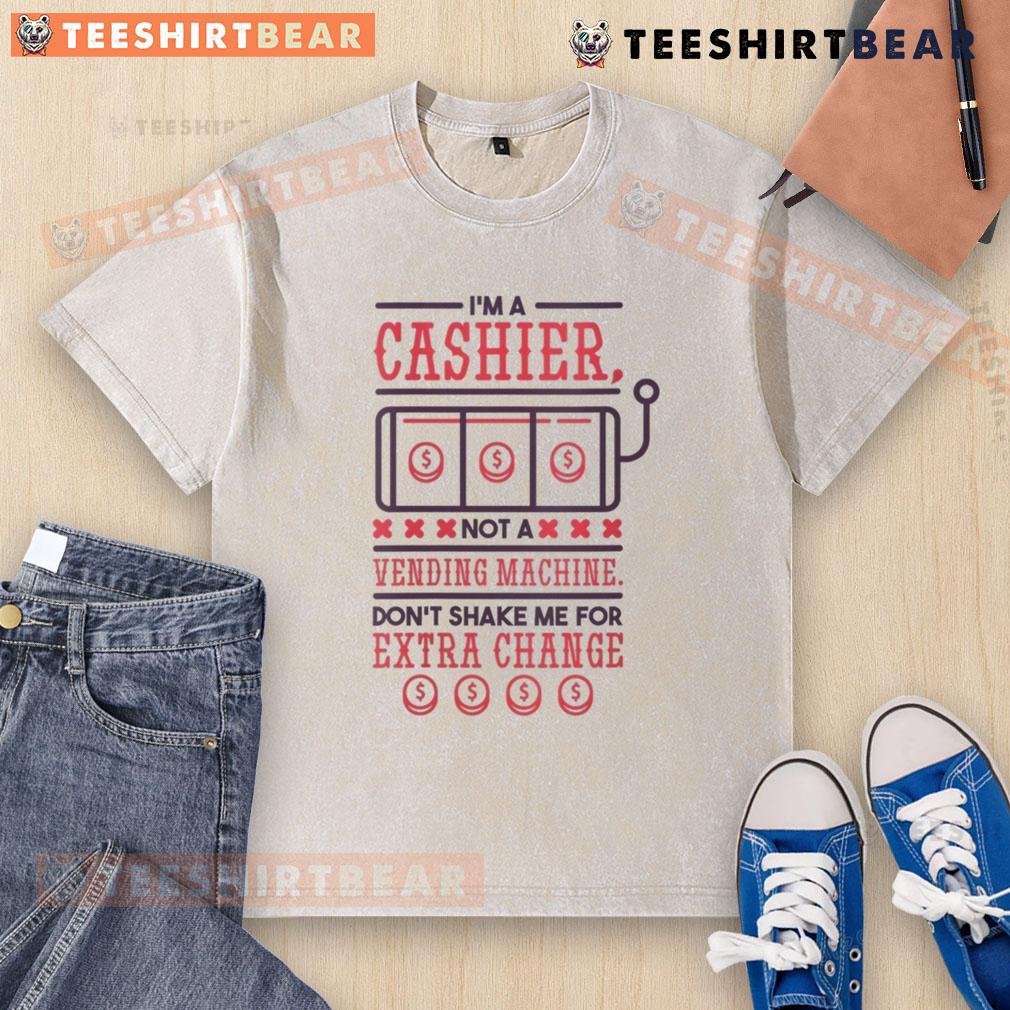 Funny I'm A Cashier Not A Vending Machine Don't Shake Me For Extra Change Washed T-Shirt Funny I'm A Cashier Not A Vending Machine t-shirt, humorously warning customers against shaking for extra change.