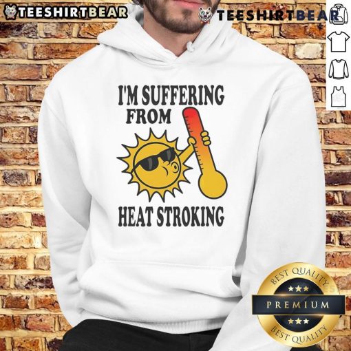Funny 'I'm Suffering From Heat Stroke' hoodie worn by a person, showcasing humor in hot weather fashion.