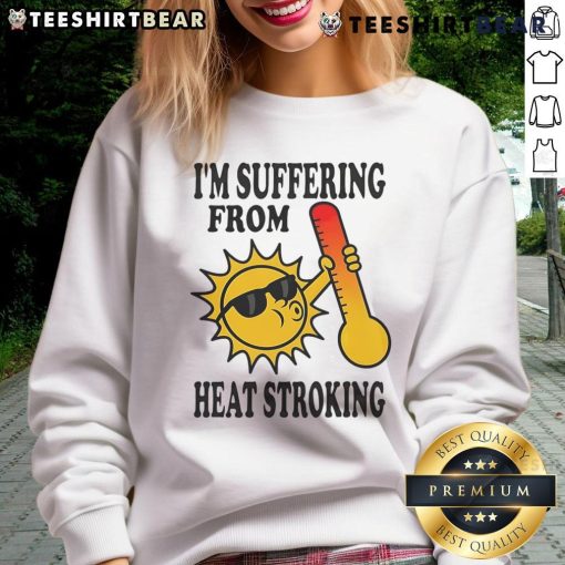 Funny sweatshirt saying 'I'm Suffering From Heat Stroke' with playful graphics, perfect for summer humor and relaxation.