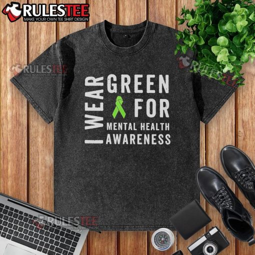 Funny May We Wear Green Messy Bun T-Shirt promoting mental health awareness with vibrant colors and a playful design.