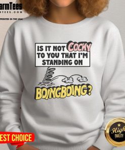 Person wearing a 'Funny Is It Not Cocky' Boing Boing sweatshirt, showcasing a playful attitude and unique style.
