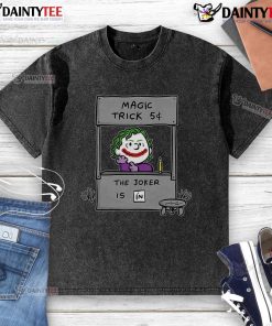 Alt Text: Funny Jokenuts Peanuts Joker 5 Cent Magic Trick on a washed t-shirt featuring The Joker design.