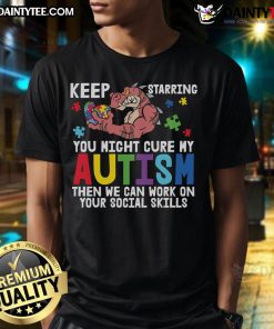 Alt Text: Funny Keep Staring Dinosaur Autism Awareness Puzzle Heart T-Shirt promoting social skills and acceptance.