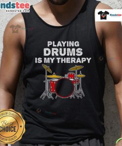 Funny drummer wearing a tank top that says 'Playing Drums Is My Therapy,' showcasing musical passion and humor.