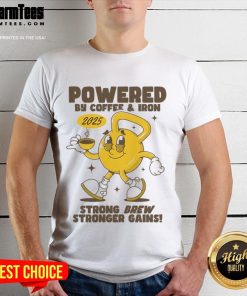 Alt Text: Funny gym t-shirt featuring a kettlebell and 'Powered By Coffee And Iron' slogan, perfect for fitness enthusiasts.