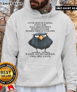 Alt Text: Funny raven design on a hoodie with the phrase A Fuck Must Be Earned showcasing unique graphic apparel.