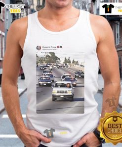 Funny image of Trump and Vance chasing Obama in police cars, wearing tank tops, showcasing a humorous political scene.