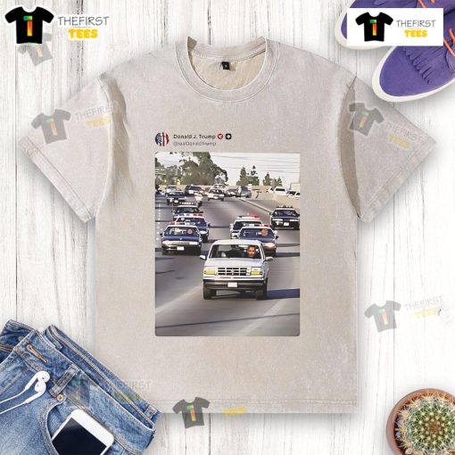 Funny real Trump and Vance chasing Obama in police cars on a washed T-shirt, showcasing a humorous political scene.