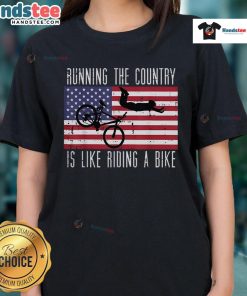 Alt Text: Funny running T-shirt saying Running the Country is Like Riding a Bike for ladies, perfect for political humor lovers.
