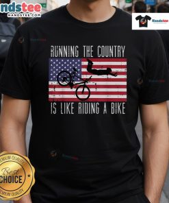 Funny Running The Country Is Like Riding A Bike T-Shirt featuring a humorous graphic design for political satire.