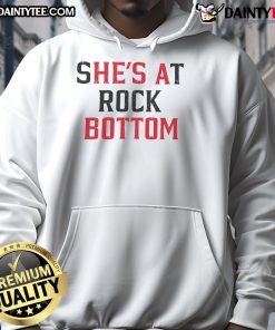 Alt Text: Funny Shes at Rock Bottom, Hes a Bottom hoodie design featuring bold text and a playful graphic.