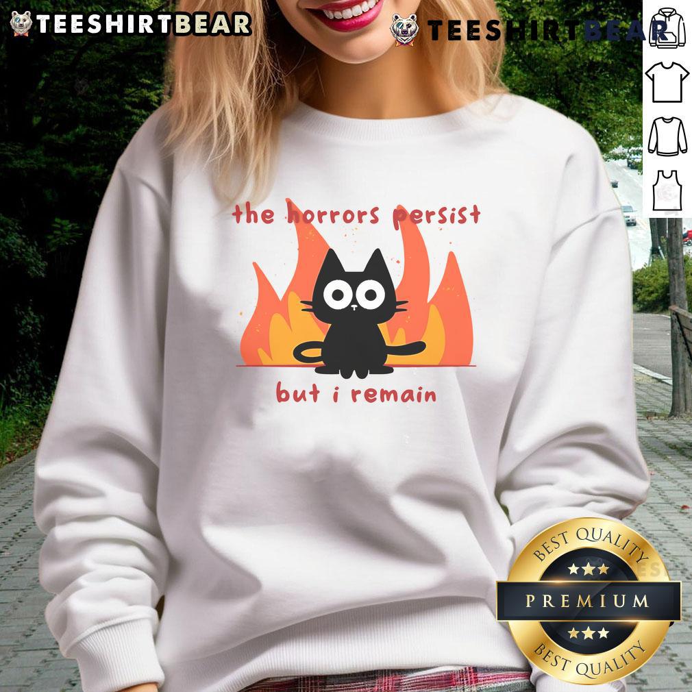 Funny Trauma Cat The Horror Persist But I Remain Sweatshirt Funny Trauma Cat sweatshirt featuring a humorous design that showcases resilience despite horror themes.