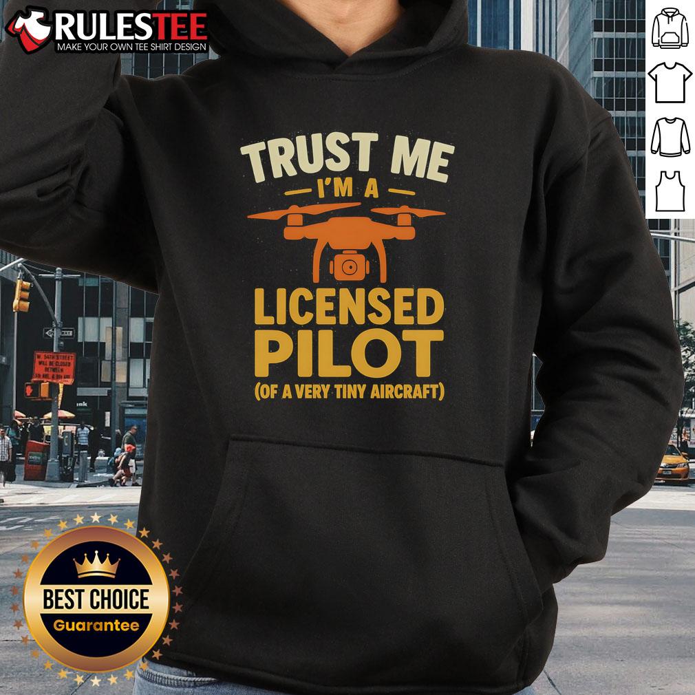 Funny Trust Me I'M A Licensed Pilot Of A Very Tiny Aircraft Hoodie Alt Text: Funny 'Trust Me I'm A Licensed Pilot' hoodie featuring a tiny aircraft design, perfect for aviation enthusiasts.