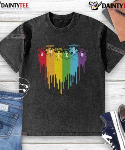 Colorful rainbow drip puzzle graphic on a washed T-shirt with 'Always Unique, Totally Intelligent, Sometimes Mysterious' slogan.