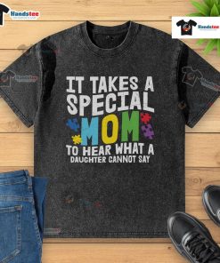 Alt Text: Special mom wearing a washed t-shirt with a heart puzzle piece design for autism awareness, celebrating love for her daughter.