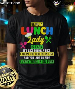 Funny 'Good Being A Lunch Lady Is Easy It's Like Riding A Bike Except The Bike Is On Fire' T-Shirt design.