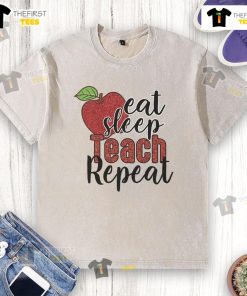 Good Eat Sleep Teach Repeat washed t-shirt design in a casual setting, perfect for teachers and educators.