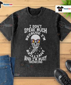 Autism skeleton puzzle graphic on a washed t-shirt, featuring glasses and the phrase about brilliance and thinking.