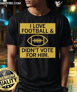 Good I Love Football And Didnt Vote For Him T-Shirt featuring a bold graphic design for football enthusiasts.