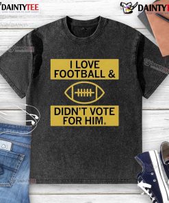 Good I Love Football And Didn't Vote For Him washed t-shirt in casual setting, perfect for football fans.