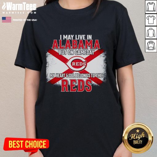Good I May Live In Alabama But On Gameday My Heart And Soul Belongs To Reds Ladies Tee shirt displayed on a hanger.