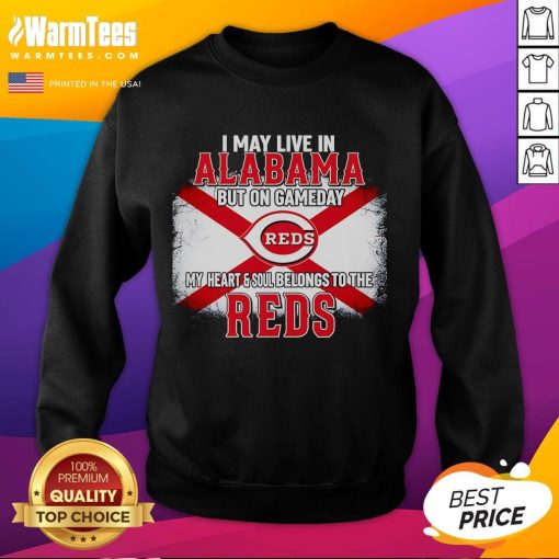Comfortable 'Good I May Live In Alabama But On Gameday My Heart And Soul Belongs To Reds' sweatshirt displayed outdoors.