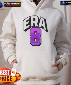 Lamar Jackson wearing an Era 8 hoodie, showcasing his style and athleticism on the field.