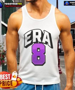 Lamar Jackson wearing an Era8 tank top, showcasing his style and athleticism in a vibrant urban setting.