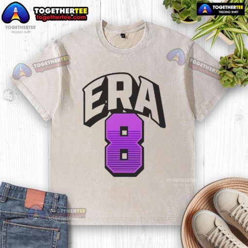 Lamar Jackson wearing a stylish Era8 washed t-shirt, showcasing a trendy casual look.