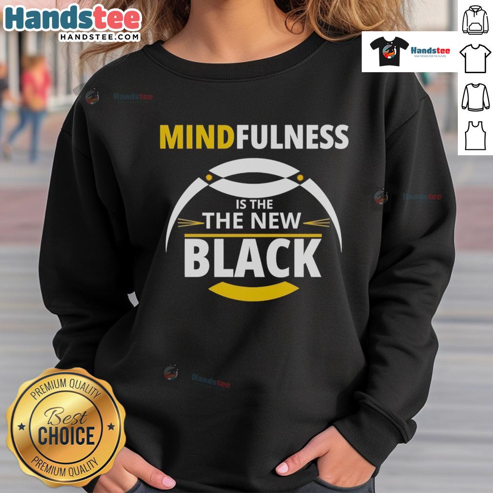 Good Mindfulness Is The New Black Sweatshirt Good Mindfulness Is The New Black sweatshirt displayed on a hanger, showcasing a stylish design and cozy fabric.